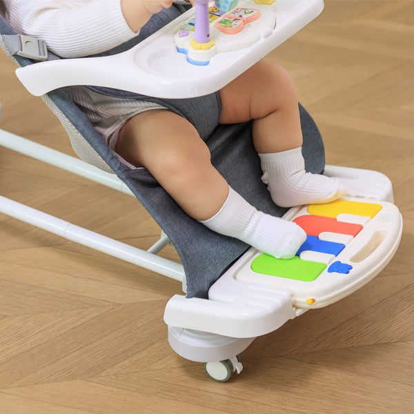 Baby building motor skills in Kick & Play mode of ergonomic 4 in 1 baby seat