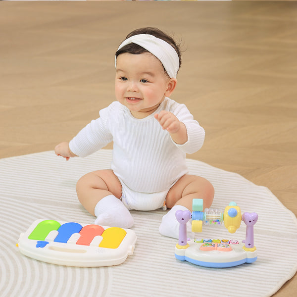 Baby enjoying Sit & Play mode in Cuddobaby 4 in 1 Baby Bounce