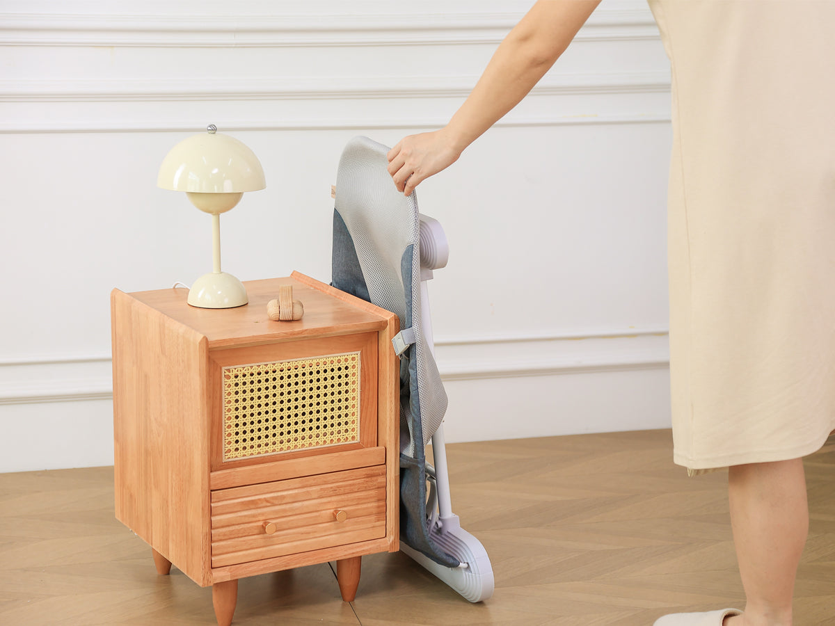 Infant developing coordination in Montessori movement development baby bouncer